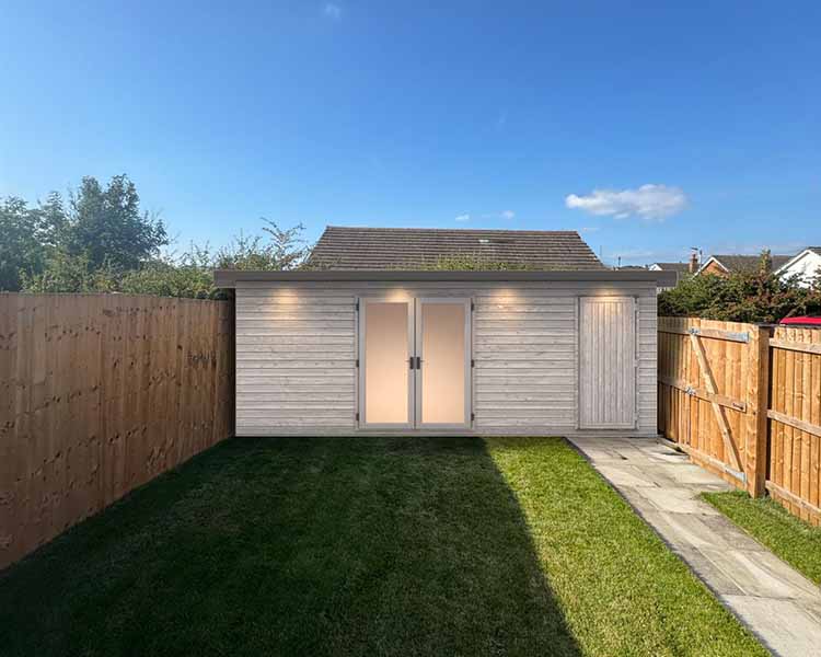 Bespoke shipping container garden room blackpool inner with living area at night Bespoke shipping container garden room blackpool inner with living area at night
