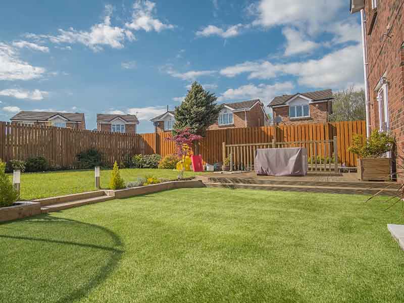garden landscaping blackpool with steps to raised lawn
