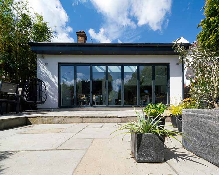 Bespoke shipping container garden room blackpool with cladding and plants Bespoke shipping container garden room blackpool with cladding and plants